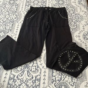 Victoria Secret Pink bradded bell pants w/ peace symbol on leg of sweats.